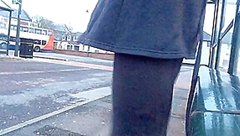 Tranny daring public bus station