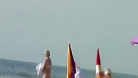 watching a large-boobed Step mother I'd like to fuck on a beach