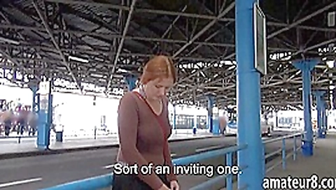 Redhead Eurobabe flashes her big tits in bus station